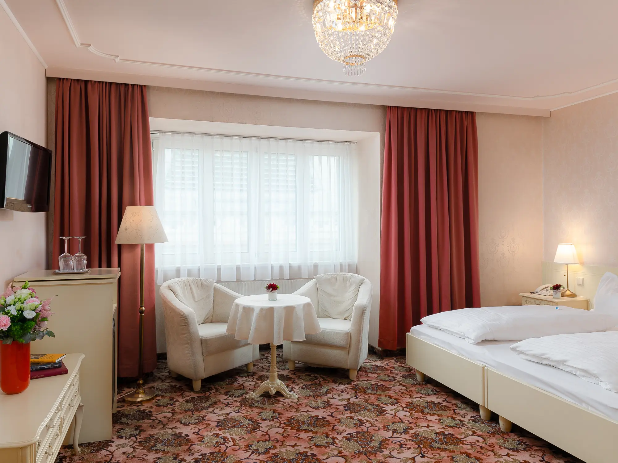 Standard Doppelzimmer mit Sitzbereich - Aviano Boutique Hotel © Stefan Resch